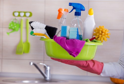 Professional cleaners beginning a thorough cleaning service in SW18